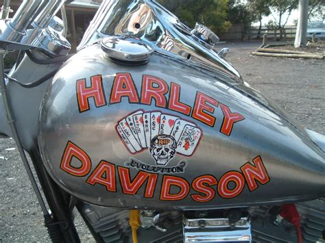 Here's a great way to jazz up your cycle or atv without a huge expenseof a customairbrush paint job. . Custom harley davidson tank emblems
